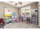 bedroom with built-in shelving and colorful decor at 31310 N 26Th Dr, Phoenix, AZ 85085