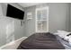 Cozy bedroom with a double bed and large TV at 31310 N 26Th Dr, Phoenix, AZ 85085