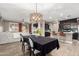 Open concept dining area with view of kitchen and living room at 31310 N 26Th Dr, Phoenix, AZ 85085