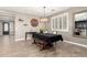 Elegant dining room with a large table and chandelier at 31310 N 26Th Dr, Phoenix, AZ 85085