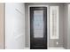 Front entry with an ornate door and sidelight window at 31310 N 26Th Dr, Phoenix, AZ 85085