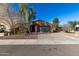 House exterior showcasing a driveway and front yard landscaping at 31310 N 26Th Dr, Phoenix, AZ 85085