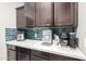 Kitchen counter with built-in coffee maker, ice maker, and air fryer at 31310 N 26Th Dr, Phoenix, AZ 85085