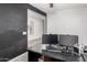 Home office with a large desk and two monitors at 31310 N 26Th Dr, Phoenix, AZ 85085