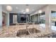 Kitchen island with double sink and granite countertops at 34357 N Red Clay Rd, San Tan Valley, AZ 85144