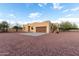 Single story home with brown exterior and a two-car garage at 38913 N 21St Ave, Phoenix, AZ 85086