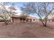 Back of house showing stucco exterior and desert landscaping at 38913 N 21St Ave, Phoenix, AZ 85086