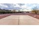 Spacious backyard patio with a gravel area and shrubs at 38913 N 21St Ave, Phoenix, AZ 85086