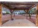 Wooden pergola in backyard providing shade and seating area at 38913 N 21St Ave, Phoenix, AZ 85086