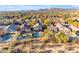 Aerial view of houses with pools and mountain views at 4529 E Coyote Wash Dr, Cave Creek, AZ 85331