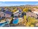 Aerial view showing house, pool, and mountain views at 4529 E Coyote Wash Dr, Cave Creek, AZ 85331