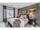 Cozy bedroom with dark gray wall and large window at 4529 E Coyote Wash Dr, Cave Creek, AZ 85331