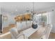View of dining room from kitchen, showcasing a light and airy space at 4529 E Coyote Wash Dr, Cave Creek, AZ 85331