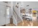 Bright entryway with a staircase, hardwood floors, and decorative accents at 4529 E Coyote Wash Dr, Cave Creek, AZ 85331
