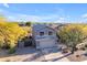 Two-story house with attached garage, driveway, and desert landscaping at 4529 E Coyote Wash Dr, Cave Creek, AZ 85331
