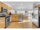 Open kitchen with stainless steel appliances and backyard view at 4529 E Coyote Wash Dr, Cave Creek, AZ 85331