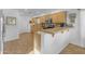 Kitchen boasts light wood cabinets, tile floors, and stainless steel appliances at 4529 E Coyote Wash Dr, Cave Creek, AZ 85331