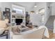 Living room with hardwood floors, high ceilings, built-ins, and staircase at 4529 E Coyote Wash Dr, Cave Creek, AZ 85331