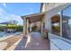 Covered patio with seating area adjacent to the pool at 4529 E Coyote Wash Dr, Cave Creek, AZ 85331