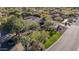 Aerial view showing a single-story home, nicely landscaped yard, and a paved driveway at 4605 E Orange Dr, Phoenix, AZ 85018