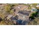 Aerial view of a home featuring a large backyard, pool, and solar panels on the roof at 4605 E Orange Dr, Phoenix, AZ 85018