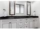 Modern bathroom with double vanity and granite countertops at 4605 E Orange Dr, Phoenix, AZ 85018