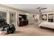 Large bedroom with a king bed and access to backyard at 4605 E Orange Dr, Phoenix, AZ 85018