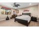 Bright bedroom with a desk and large window at 4605 E Orange Dr, Phoenix, AZ 85018
