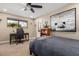 Comfortable bedroom with a workspace and large art at 4605 E Orange Dr, Phoenix, AZ 85018
