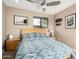 Cozy bedroom with a ceiling fan and window at 4605 E Orange Dr, Phoenix, AZ 85018