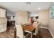 Bright dining room with a view into the kitchen at 4605 E Orange Dr, Phoenix, AZ 85018