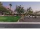 Stunning home exterior at dusk, showcasing landscaping at 4605 E Orange Dr, Phoenix, AZ 85018