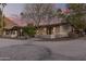 Home exterior at dusk with mountain backdrop at 4605 E Orange Dr, Phoenix, AZ 85018
