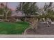 Home exterior at dusk showcasing landscaping at 4605 E Orange Dr, Phoenix, AZ 85018