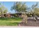 Beautiful home exterior with landscaped lawn and mature trees at 4605 E Orange Dr, Phoenix, AZ 85018