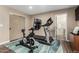 Home gym with treadmill and stationary bike near bathroom at 4605 E Orange Dr, Phoenix, AZ 85018