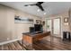 Bright home office with a large desk and hardwood floors at 4605 E Orange Dr, Phoenix, AZ 85018