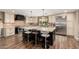 Modern kitchen with large island, stainless steel appliances, and granite countertops at 4605 E Orange Dr, Phoenix, AZ 85018