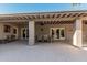 Spacious patio with dining set and access to the house at 4605 E Orange Dr, Phoenix, AZ 85018