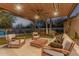 Relaxing patio with seating area and pool view at 4605 E Orange Dr, Phoenix, AZ 85018