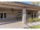 Covered patio with dining area, ping pong table, and access to the house at 4605 E Orange Dr, Phoenix, AZ 85018