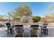 Spacious patio with fire pit and comfortable seating at 4605 E Orange Dr, Phoenix, AZ 85018