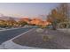 Scenic street view with mountain backdrop at sunset at 4605 E Orange Dr, Phoenix, AZ 85018