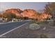 Residential street view with mountain backdrop at dusk at 4605 E Orange Dr, Phoenix, AZ 85018