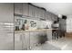Organized workshop with gray cabinets and work bench at 4605 E Orange Dr, Phoenix, AZ 85018