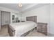 Cozy bedroom with wood-toned furniture and tiled floors at 4808 N 24Th St # 1123, Phoenix, AZ 85016