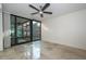 Bedroom with tiled floors, large window, and private balcony at 4808 N 24Th St # 1123, Phoenix, AZ 85016
