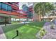 Landscaped courtyard with artificial turf and sitting areas at 4808 N 24Th St # 1123, Phoenix, AZ 85016