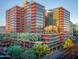 Modern high-rise building with city views and palm trees at 4808 N 24Th St # 1123, Phoenix, AZ 85016