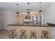 Modern kitchen with stainless steel appliances and breakfast bar at 4808 N 24Th St # 1123, Phoenix, AZ 85016